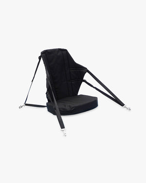 Black kayak seat with adjustable straps, pockets and footrest add-on