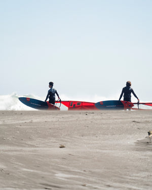 Red and blue Hyper Windsurf Board with white logo, fiberglass foam