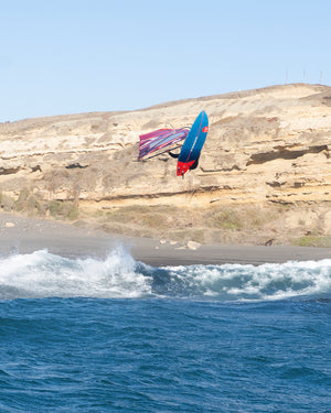 Ultra Windsurf Board with blue and red carbon fiber design