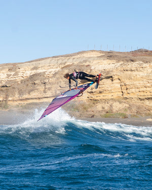 Purple pink windsurfing sail with black harness for Ultra Windsurf Board