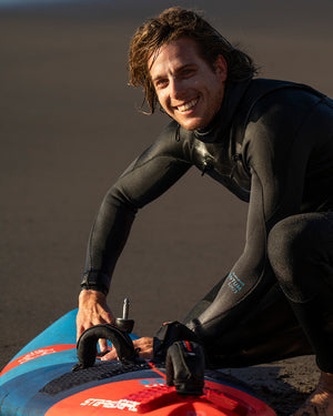 Ultra Windsurf Board: blue red inflatable watercraft with black trim