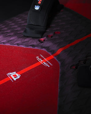 Red and black iGnite Air Windfoil Board yoga mat with white logo and grip texture