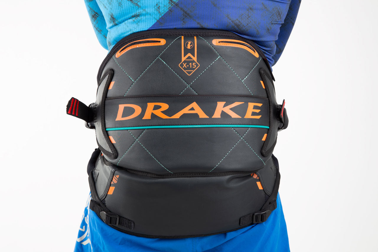 Jim Drake black and orange drake knee pads with quilted design