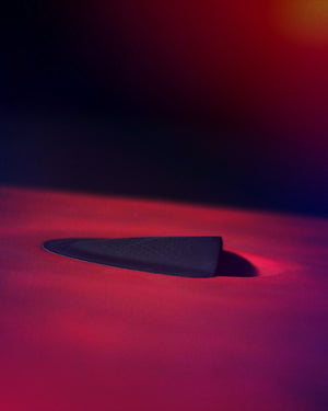 Black paper airplane with red glow in NEW All Star Paddleboard