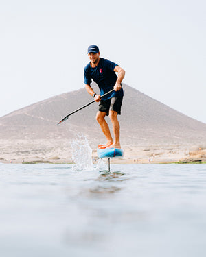 Ace Foil Lightning blue hydrofoil board with white fins, black leash for downwind performance