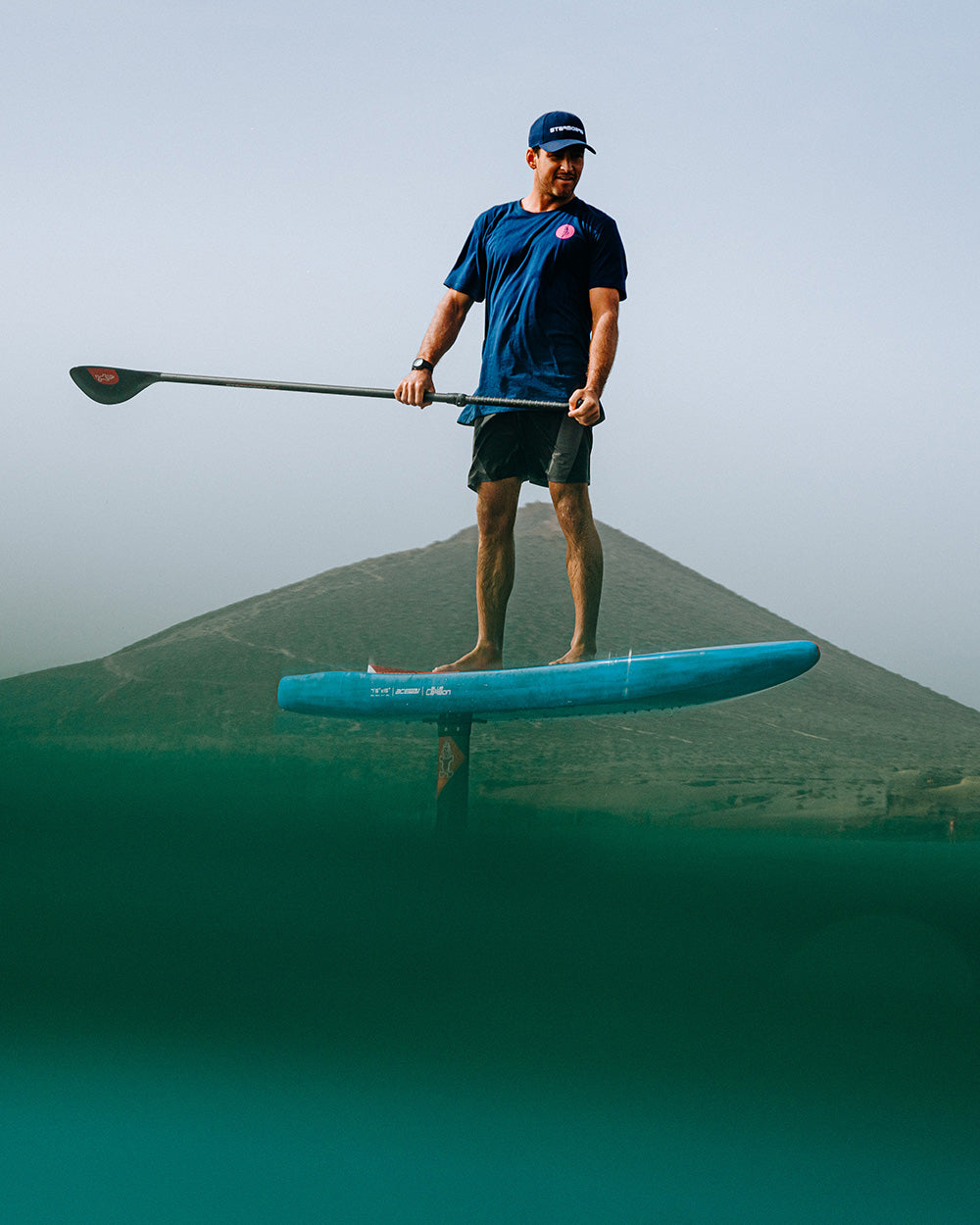 Ace Foil Lightning Foilboard: Blue SUP with black handle, silver blade for downwind performance