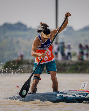 Lima Prepreg Carbon Paddle: sleek black teal starboard paddle board