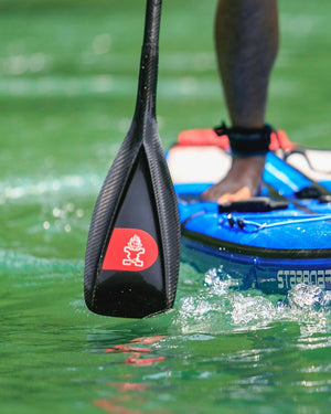 2025 Lima Prepreg Carbon Paddle by Starboard with red logo and black grip