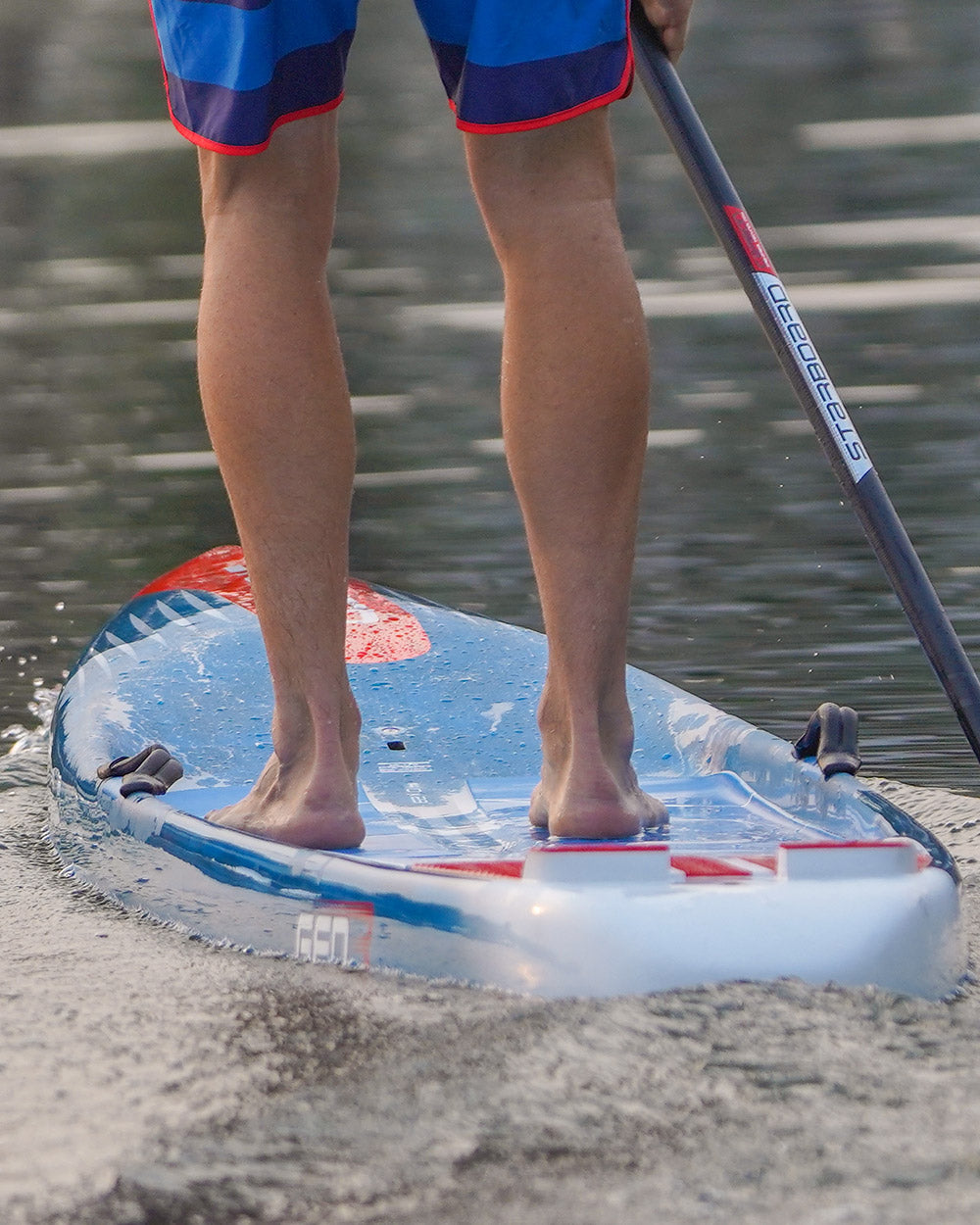 Gen R blue and red inflatable paddleboard with white accents