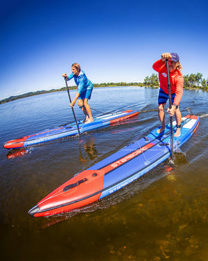 Sleek red and blue All Star iSUP paddle board with poplar wood construction