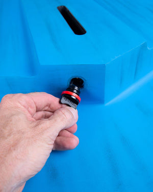 Black and red textured grip cap for Millennium Windfoil Board water filter