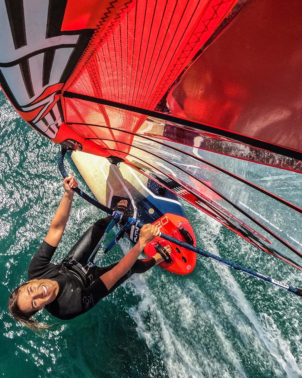 2025 Futura Windsurf Board: red and black sailboard with white trim