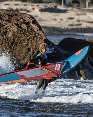 2025 Ultra Windsurf Board with red blue design black fins St Sherborne text