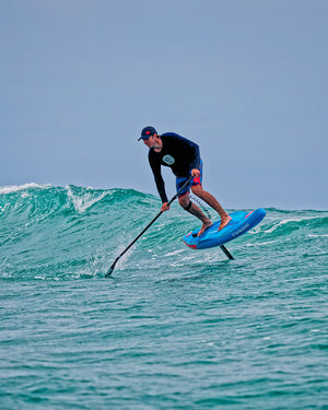 Blue Ace Air Foil Inflatable Foilboard with black leash and red ankle strap