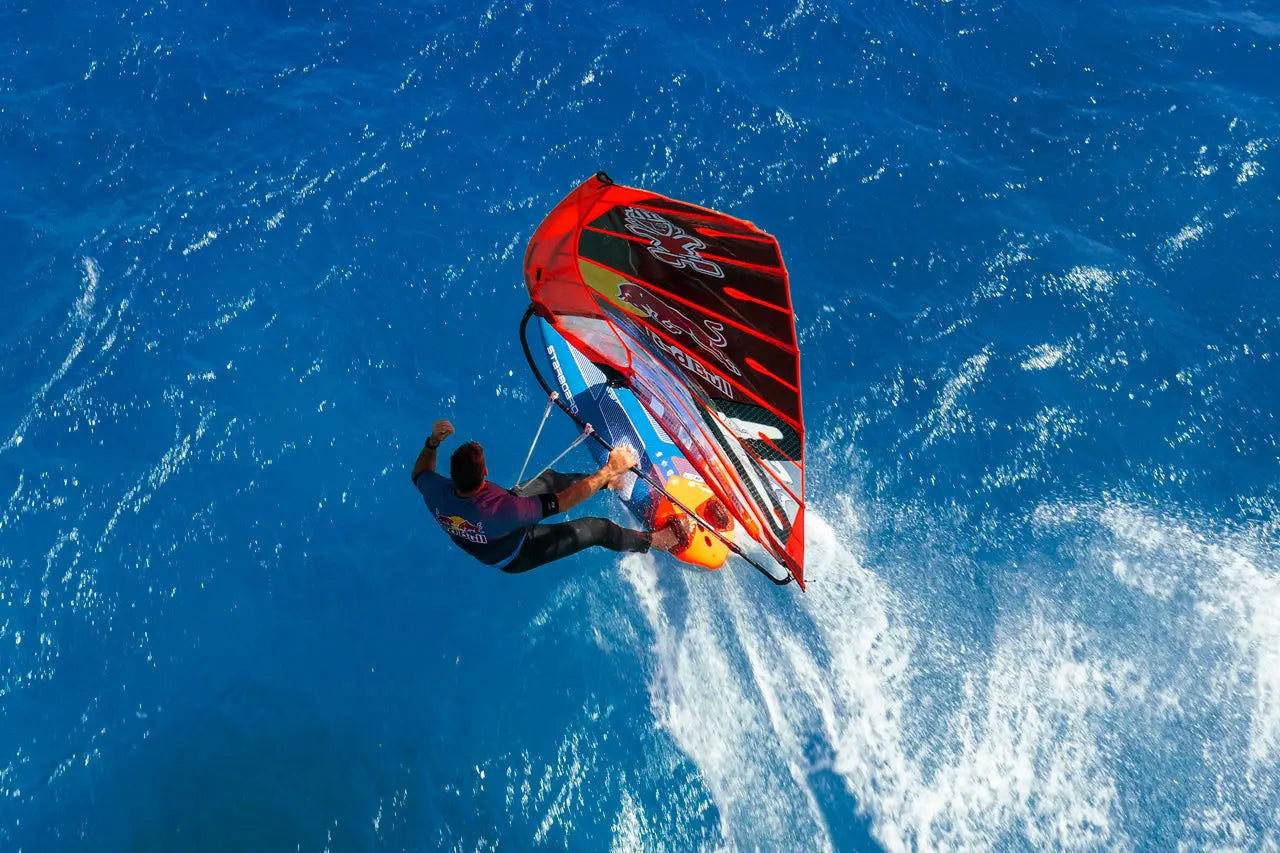 Red and blue Dunkerbeck Speed Challenge sail with logo