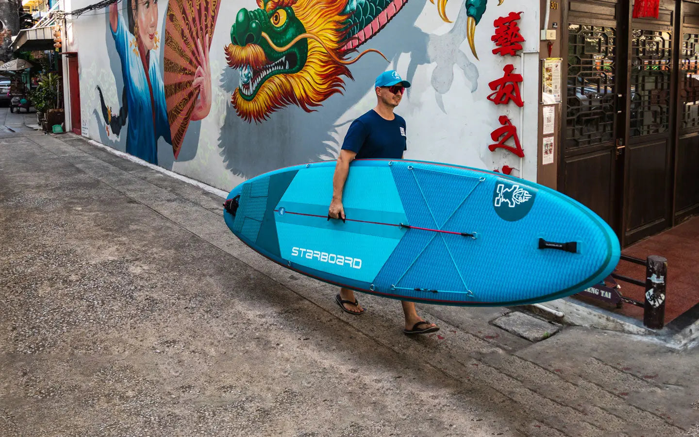 Blue SUP with white black text in deluxe lite construction design