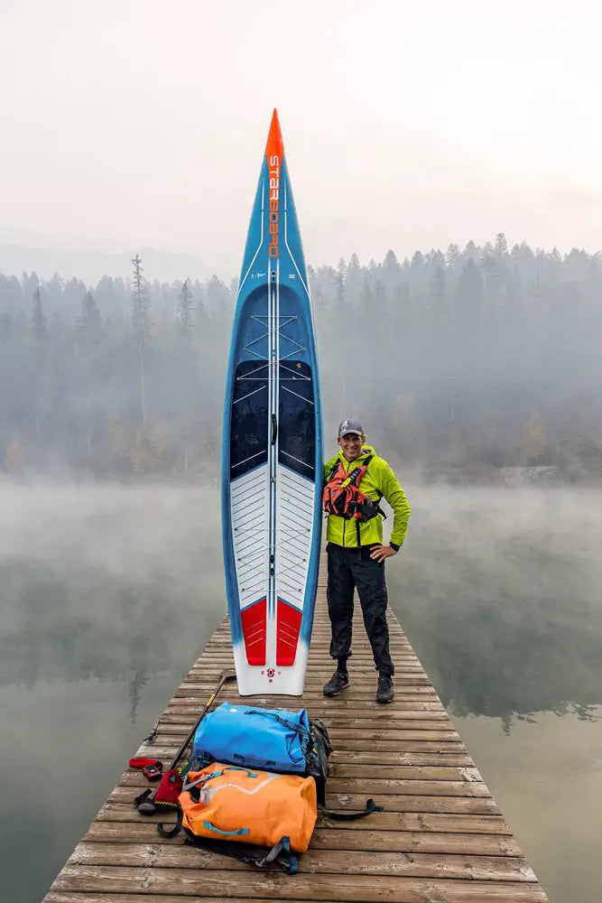Blue and white 2019 NRS Big Water kayak with red accents