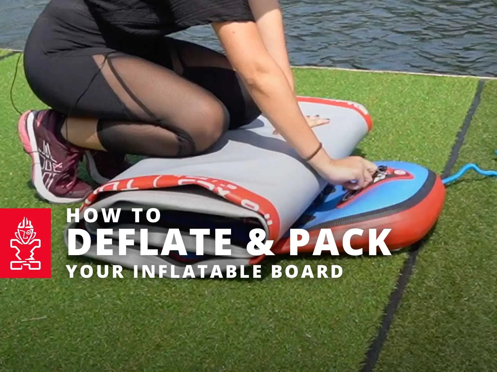 Compact inflatable paddleboard with red and blue accents for easy storage