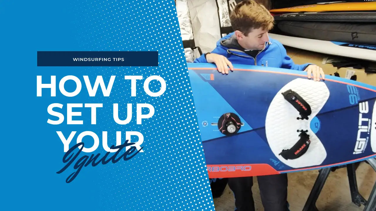 Blue and white Ignite windsurfing board with black accents