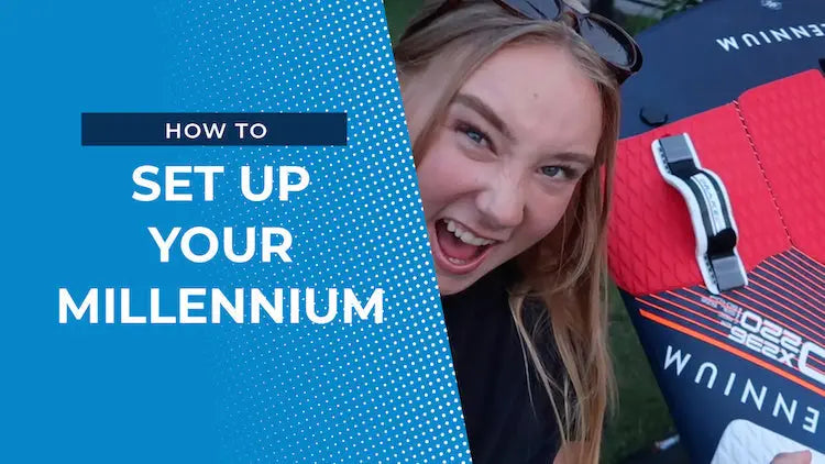 Red and black Millennium snowboard with white text in setup guide