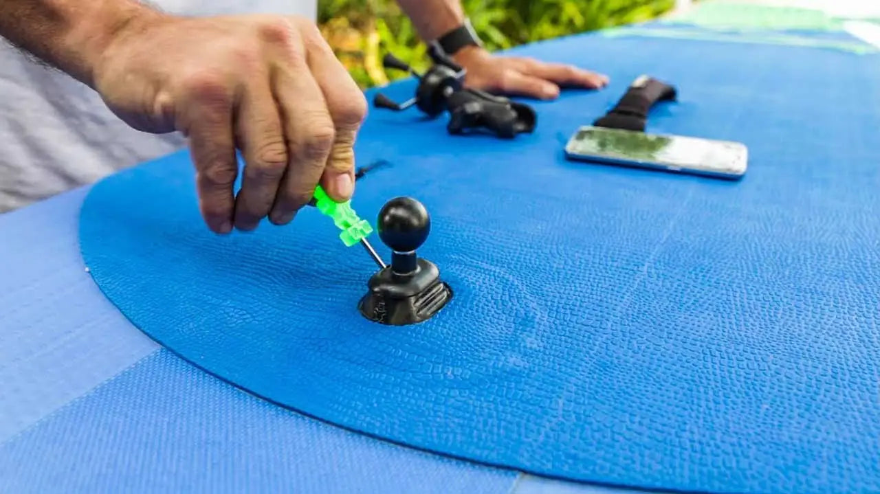 Classic black arcade joystick with green lever and silver ball top