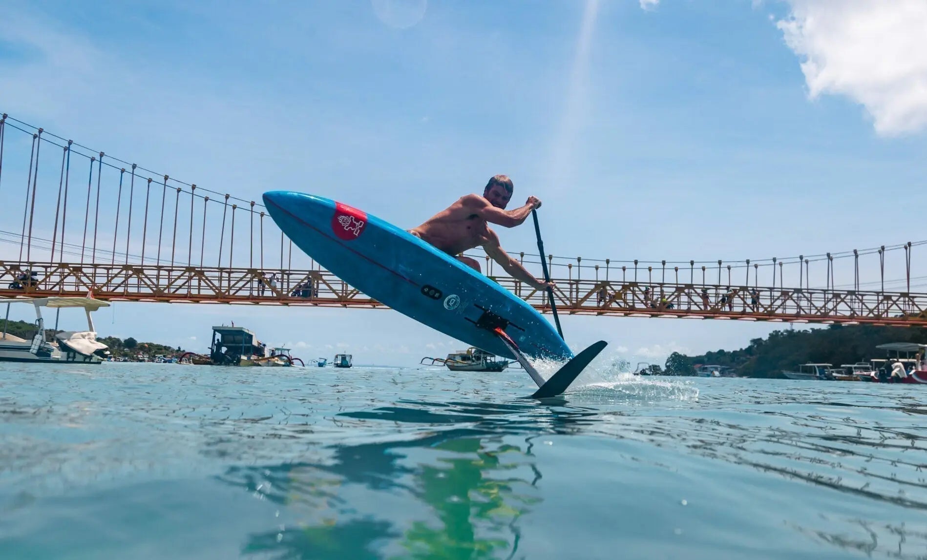 New Ace Foil blue hydrofoil board with white logo and red fins