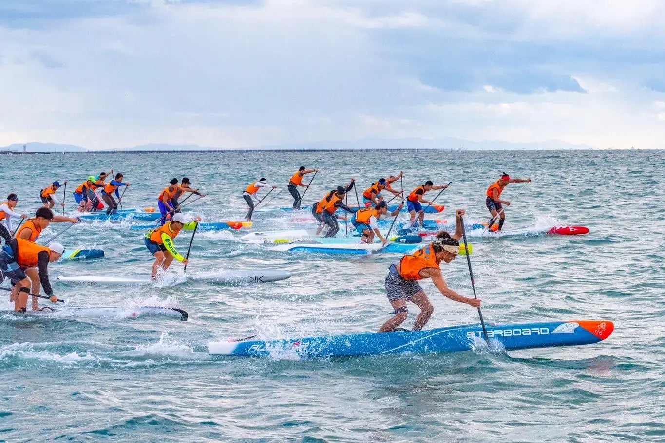 BIC orange and blue paddleboard in Rai Taguchi’s 2023 All Japan win