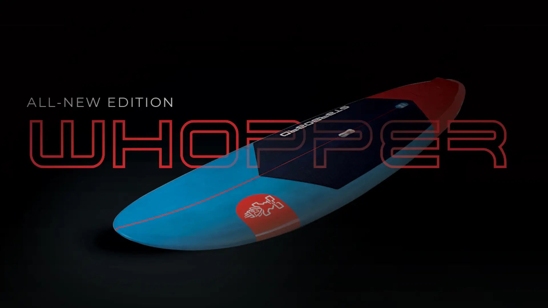Blue and red fiberglass surfboard with Starboard Whopper logo