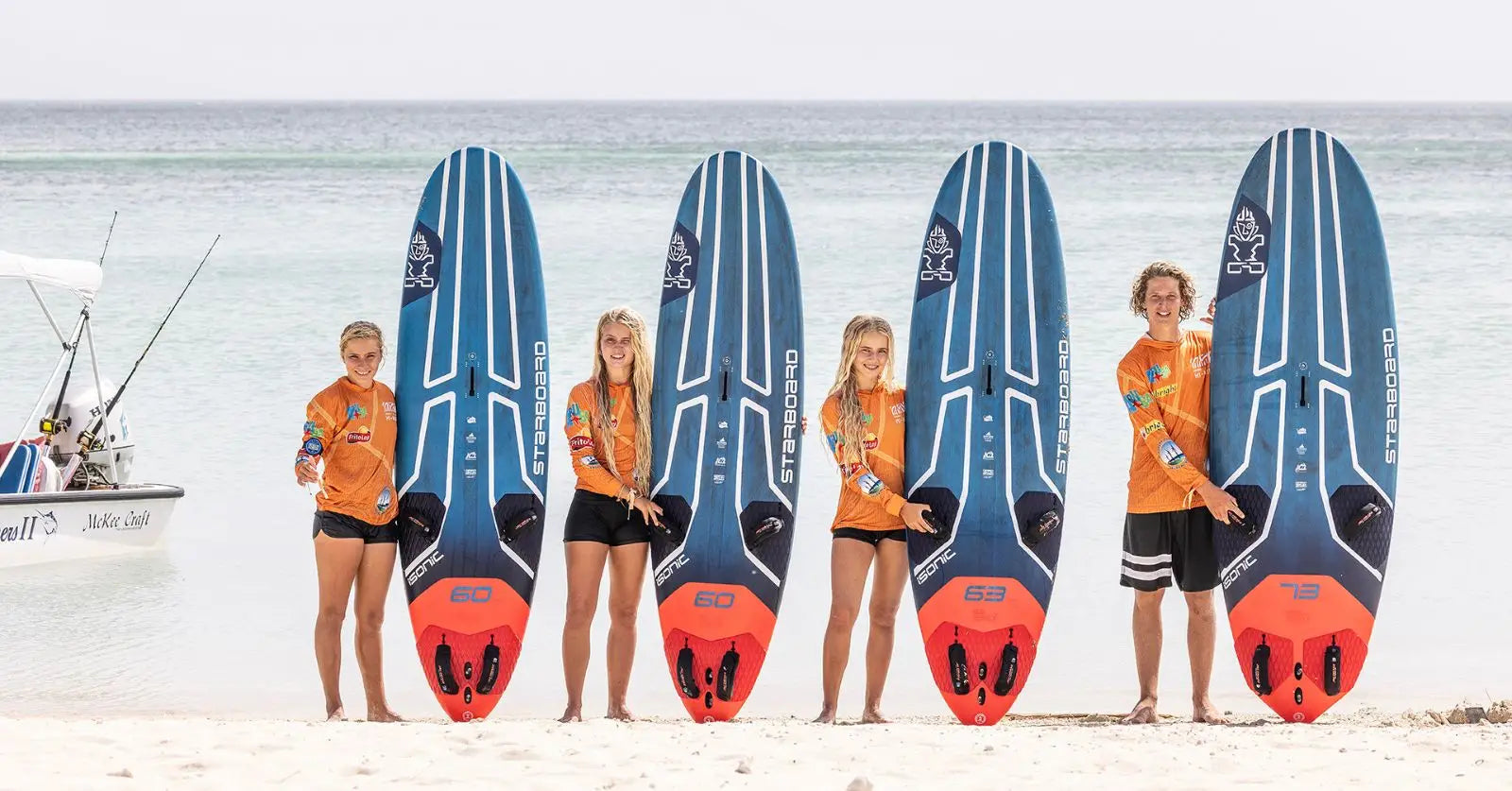 Blue and orange Starboard inflatable paddleboard for junior riders at PWA Youth Slalom World Cup on Aruba