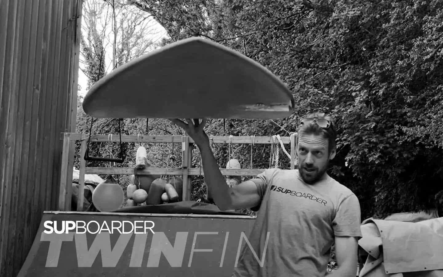 Starboard Twin Fin 85L SUP board with pointed ends and sleek fiberglass design