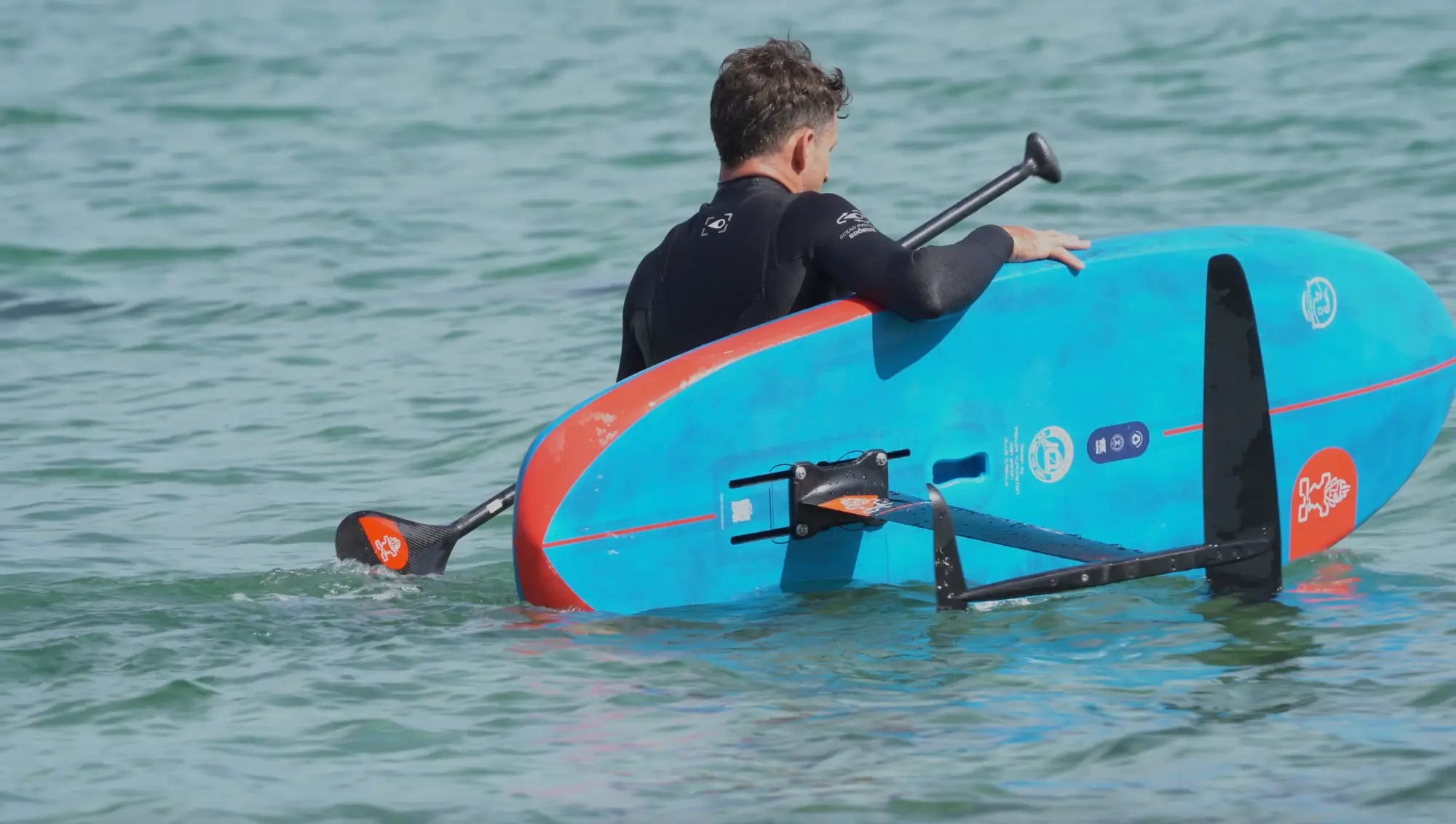 Benoit Carpentier rides Take Off 6’6” x 25” blue-red SUP with black accents