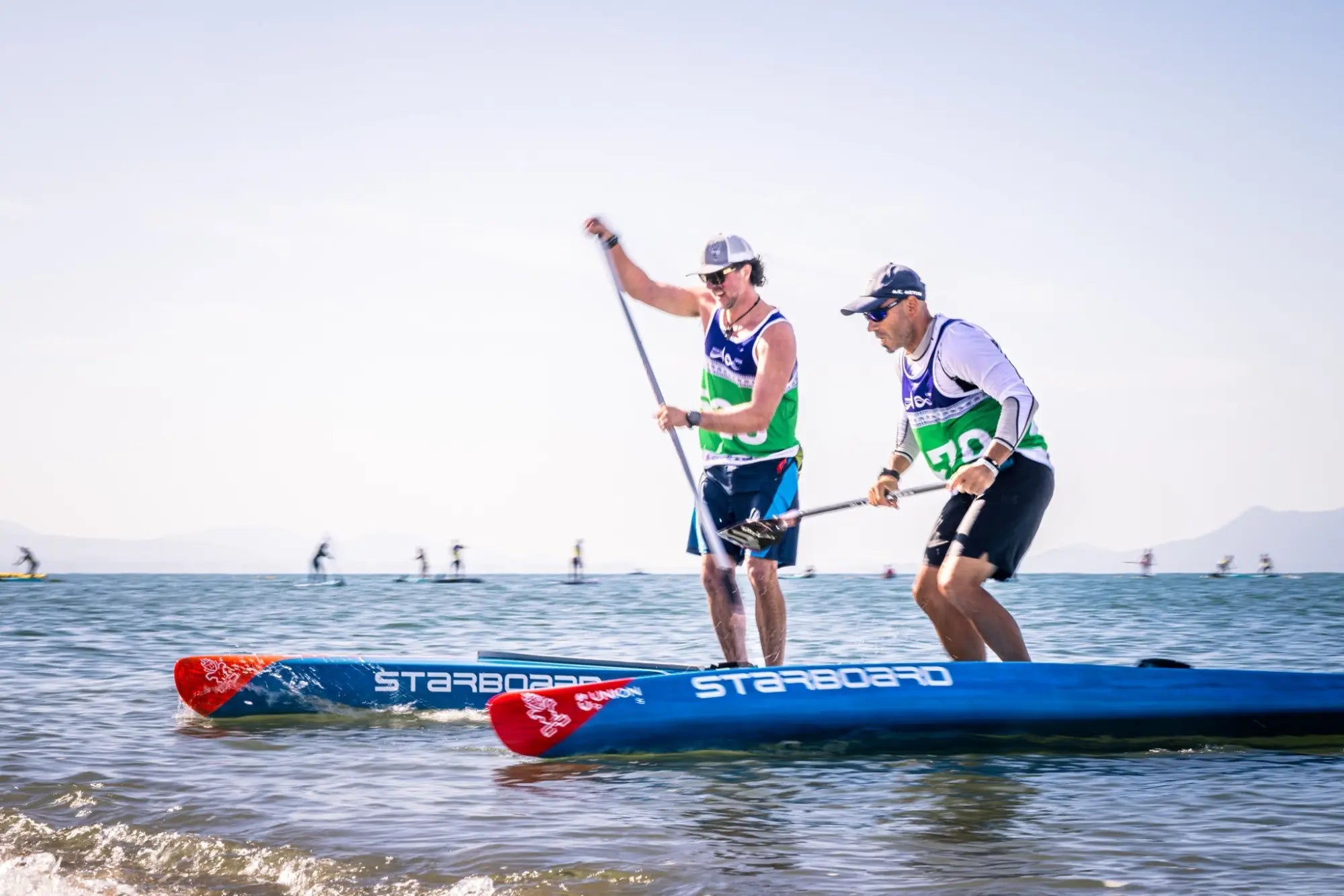 Red and blue Starboard stand-up paddleboard for racing rentals