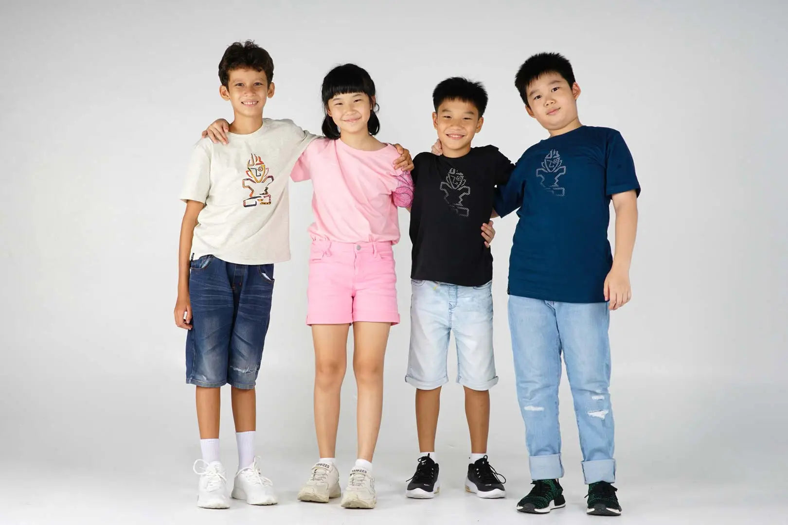 White kids t-shirt with elephant print, denim shorts, sneakers