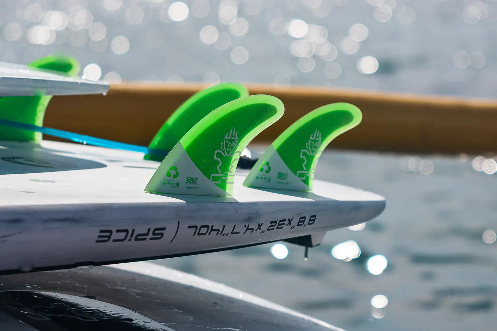 Green Armacore SUP fin stabilizer for surfboard, plastic and foam.