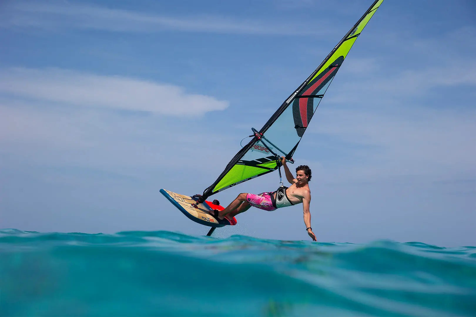 Green yellow windsurfing sail with black accents, durable nylon, Foil X