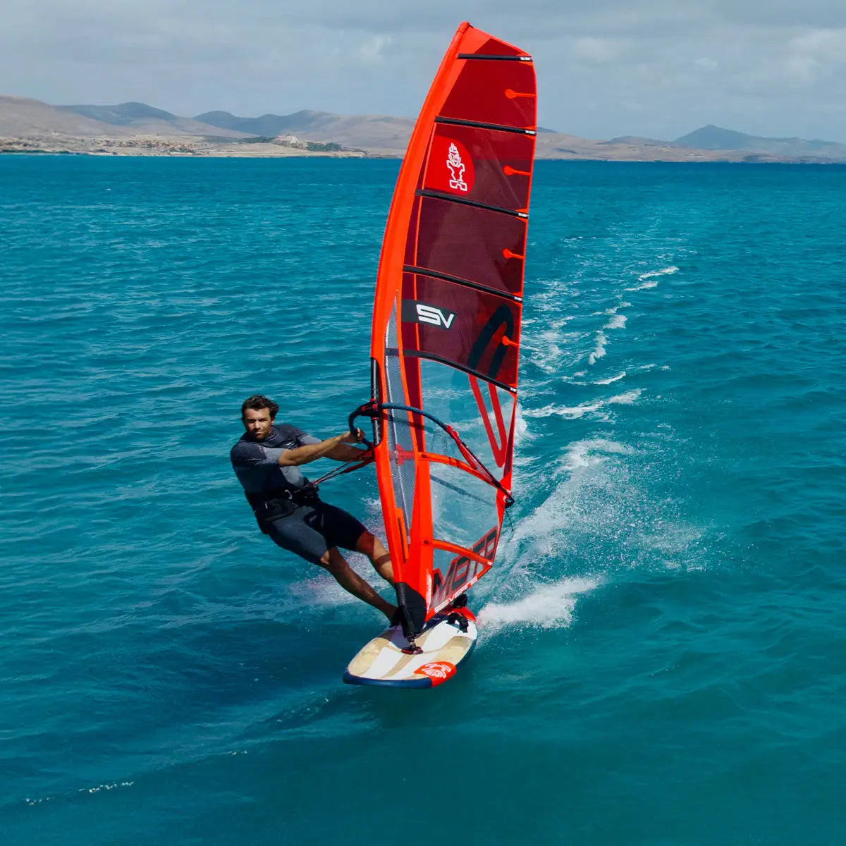 Sleek red Ezzy Futura windsurf board with white black accents