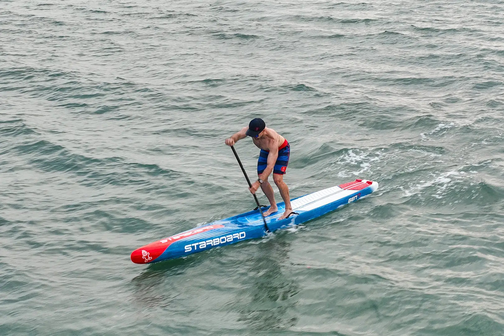 Gen R blue and red stand-up paddleboard with standup text design