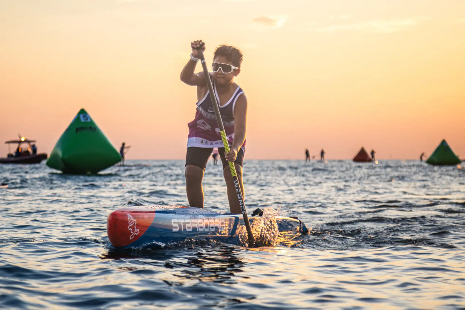 Inflatable junior stand-up paddleboard in white and blue