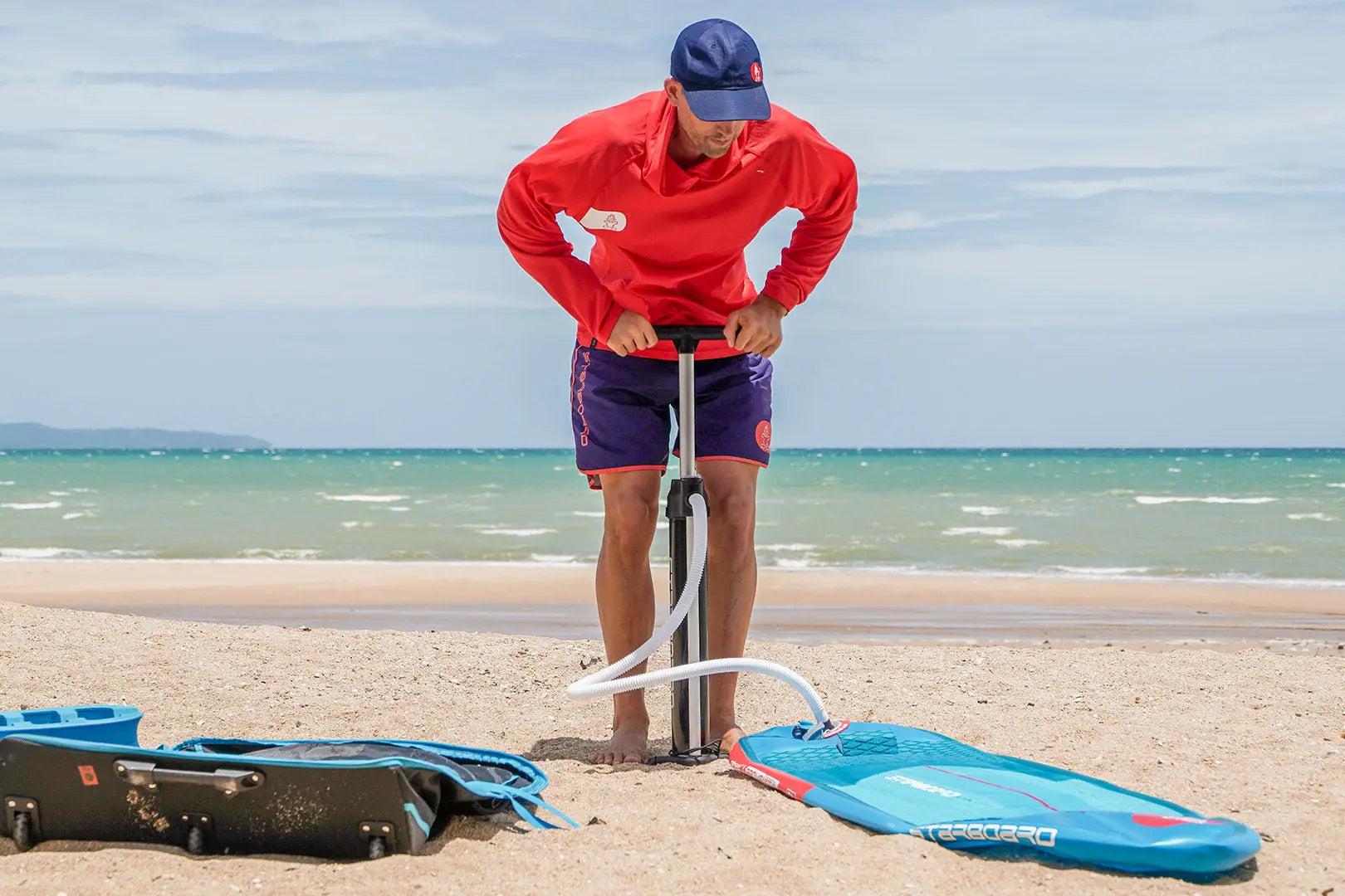 Red and white pump with blue handle in Pump collection