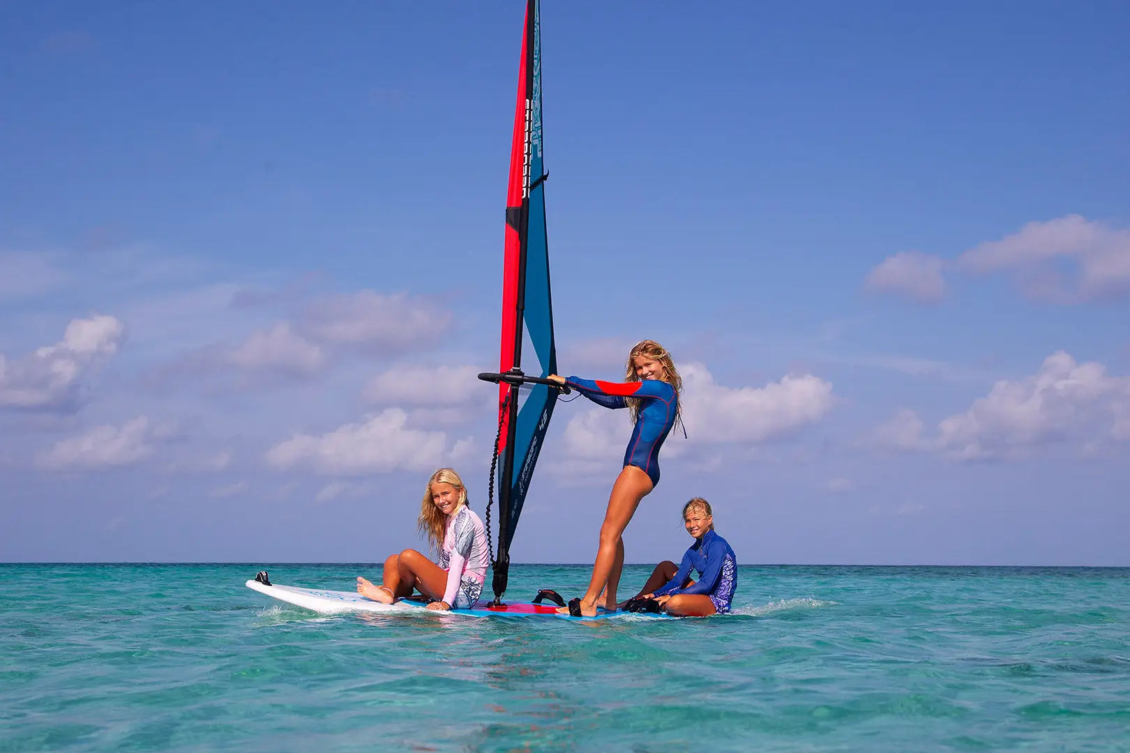 Rio Windsurf Boards: red and blue sail windsurfing board with white deck