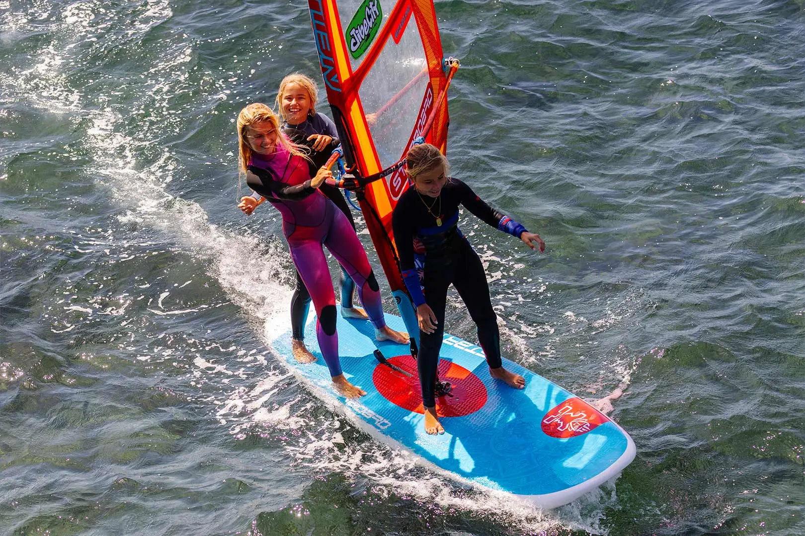 Vibrant Start2 Windsurf Board with Colorful Design and Blue Sail