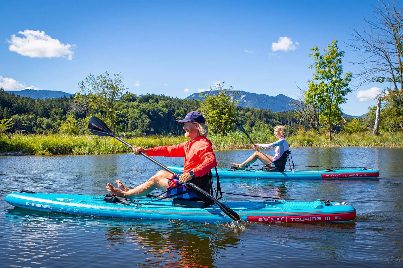 Blue and Teal 2019 Perception Touring 3.5 Kayak with Black Paddle