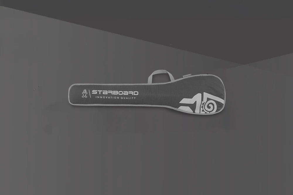 Black and white starboard SUP paddle bag with logo