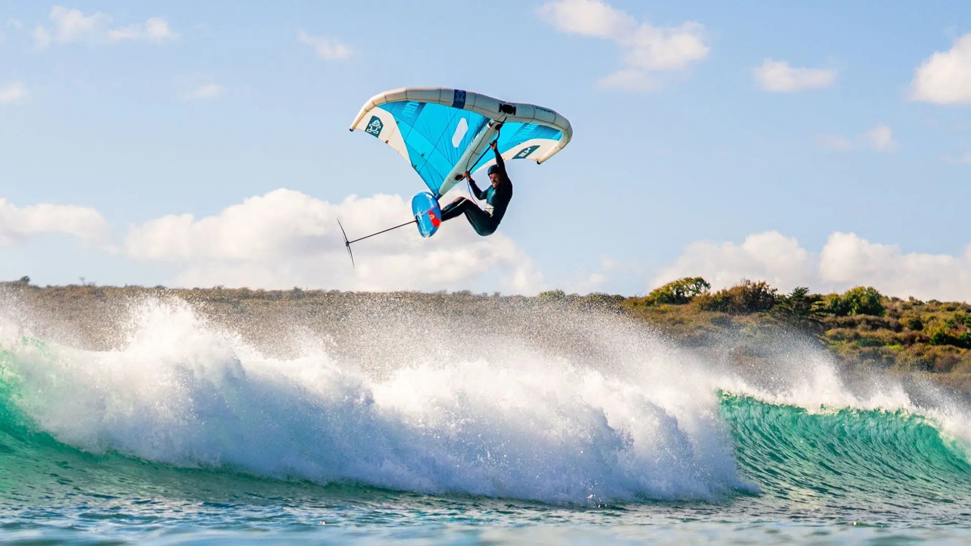 Blue kite with white accents and black lines for high performance kitesurfing in Wings collection