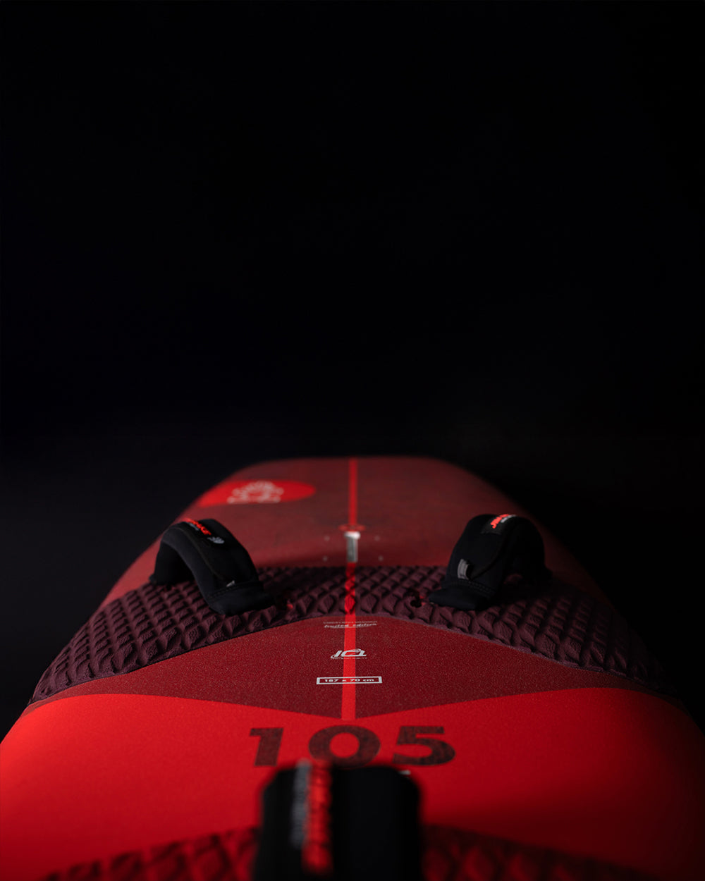 Red iGnite Air Windfoil Board ski boot with black accents and textured nylon pattern