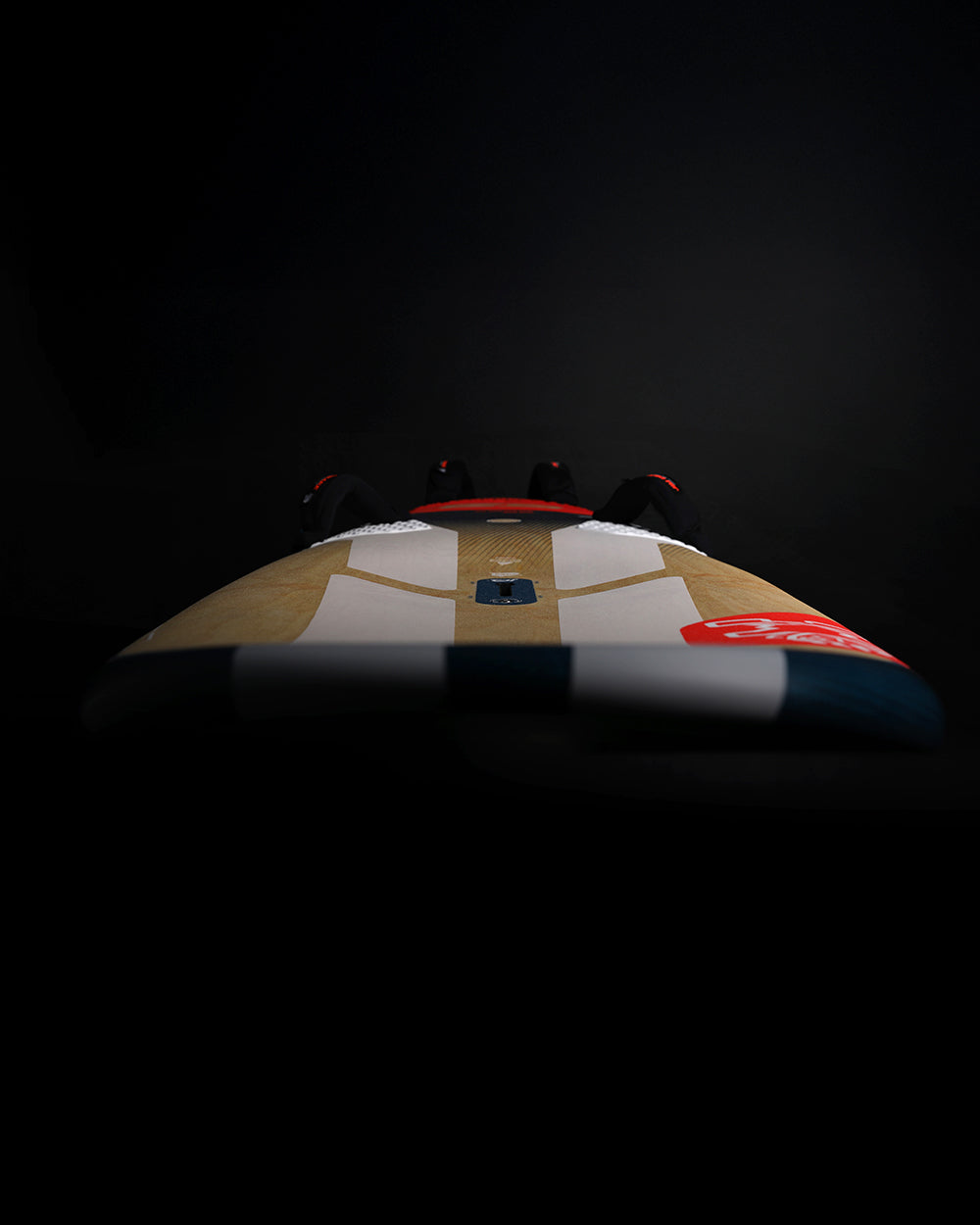 Gold and white Mickey Mouse plush with red ears on iSonic Windsurf Board