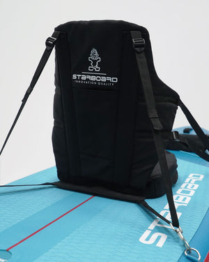 Black starboard backpack for touring inflatable board with adjustable padded straps