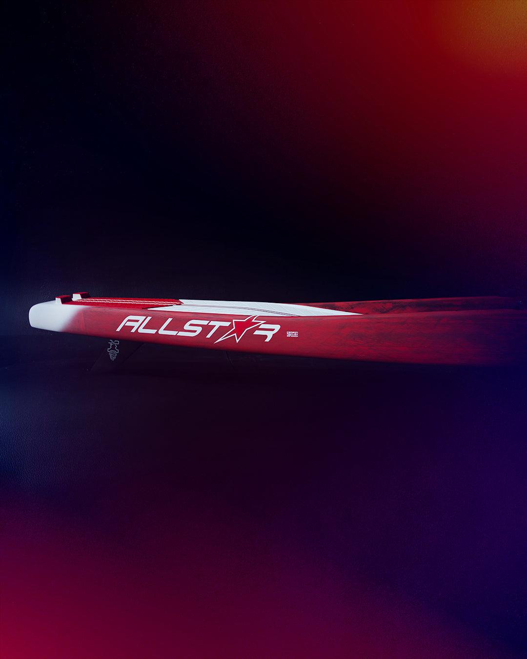 Red Allstar Paddleboard with white accents and black fins