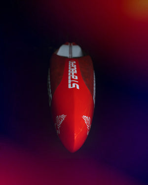 Red and white Rebels toy rocket on All Star Paddleboard