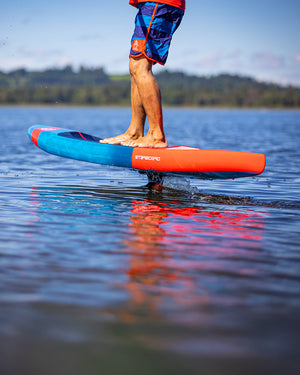 Sleek blue and orange Ace Foil Lightning hydrofoil board for downwind performance
